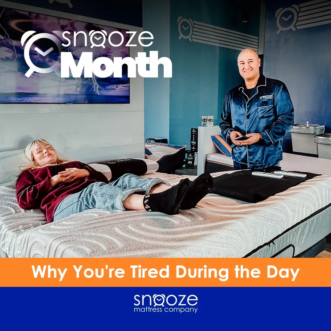 Woman laying happily on Snooze mattress